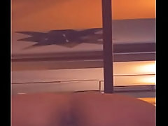 mi compa llega del bar y aprovecho a tocarlo sobre la ropa hasta que se erecta