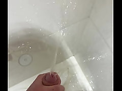 Pissing &amp_ Jerking Off At The Same Time