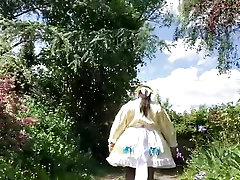 In an outfit with a yellow and blue maid dress for a day.