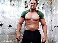 Muscular amateur star Yuri Gaucho showcases his hefty uncut cock for a steamy handjob