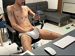 Skinny guy in jeans, pulls his dick out and jerks off on webcam.