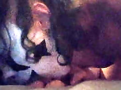 deep throating a dildo with clown makeup on