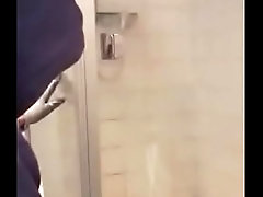 Window painter guy : Painting the slippery shower glass .