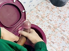 Amateur gay man jerks off in street food shop toilet