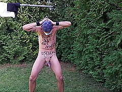 naked gay slave pig exposed outdoor in penis cage, striptease humiliating body writing in front of party guests, BDSM CBT