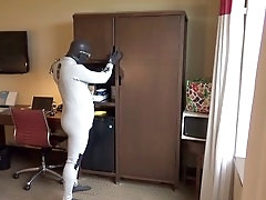 Wet and wild wetsuit action in a motel room