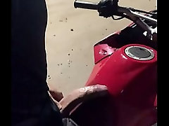 Big dick jerking off on a motorcycle