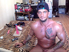 inked suntanned muscle grizzly playing with himself (part 1)