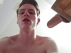 Good looking twink gagging and riding on dildo