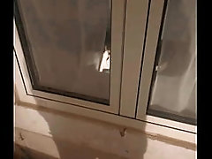 Spying flatmate Jerking Off (from the street window)